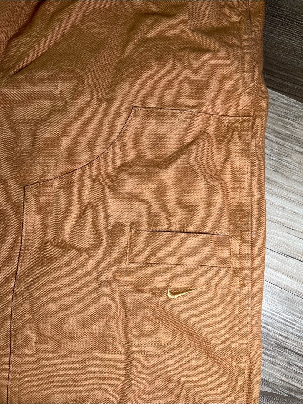 Nike Kids Rust Orange Cargo Jeans with Gold Swoosh Accent